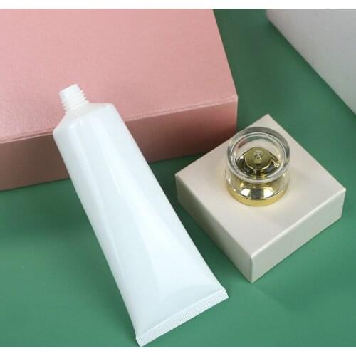 80 ml 50pcs glossy white plastic tube / acrylic gilded cover / emulsion cream tube / PE cosmetic packaging empty bottles