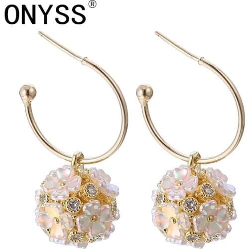 ONYSS Luxury Earrings 2021 Trend Jewelery Women Long Pendants Cross Piercing Hollow Out 3A Zircon Flower Shape Dangling Earrings