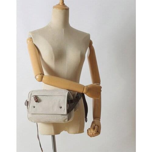 Retro Trend Chest Bag Outdoor Leisure Diagonal Bag Multi-function Shoulder Backpack Canvas Bag with The First Layer of Cowhide