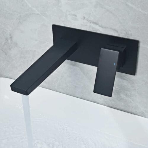 Hidden black fixed on the faucet wall of the basin single fist mixer tap of hot and cold water from the bathroom bronze sink