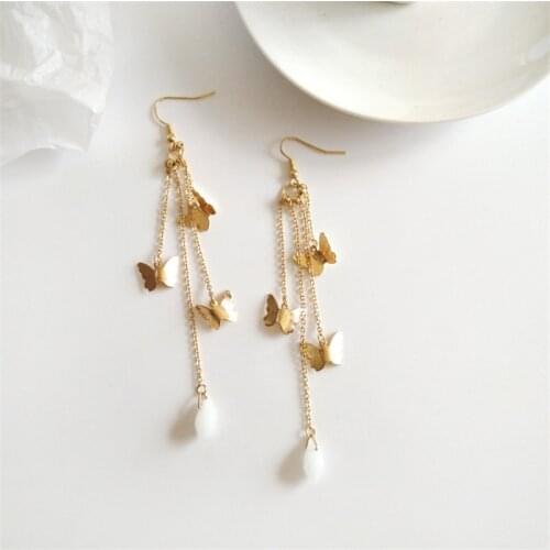 New Korean fashion temperament female long chain bow earrings beautiful student creative ear clip friends gift