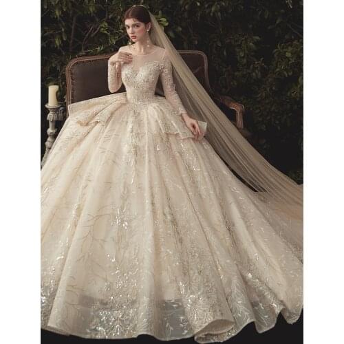 Luxury Lace Wedding Dresses Long Sleeves Shiny Beads Sequins O-Neck Illusion Princess Cathedral Bridal Gowns Elegant 2021 Dubai