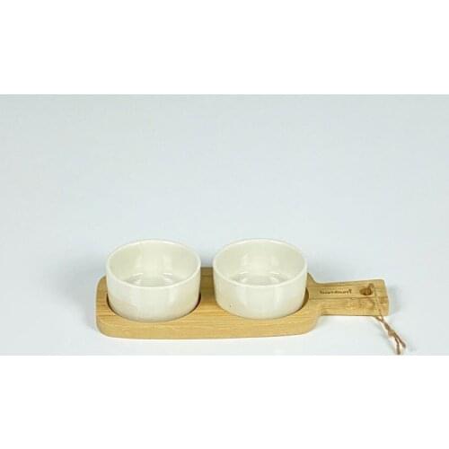 Two circle pieces porcelain sause bowl set on bamboo base
