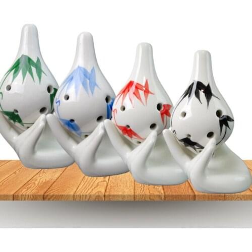 Six hole pottery flute wholesale small long mouth 6 Hole bamboo leaf scenic musical instrument flute whistle AC tone