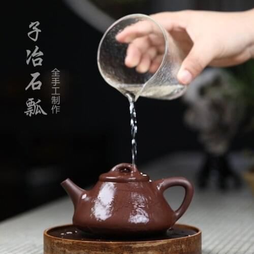 Old purple clay] copy ancient money all hand yixing recommended famous ceramic tea-pot smelting stone gourd ladle pot