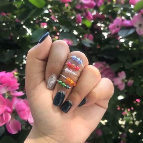 Japanese and Korean style new multicolor rice bead rotatable female ring 2021 fashion creative anxiety relief ring