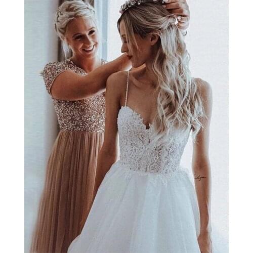 Backless Wedding Dresses A-line Spaghetti Straps Tulle Appliques Lace Dubai Arabic Wedding Gown Bridal Dress Vestido De Noiva