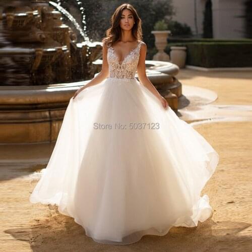 A-Line Wedding Dresses Lace Appliques Tulle V-Neck Sleeveless Backless Bridal Gown Vestido De Noiva Customize Plus Size