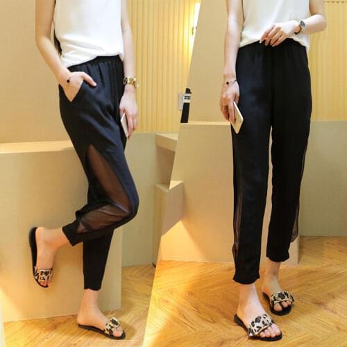 Chiffon pants womens summer new style black high-waist thin nine-point pants loose side slits hollow mesh harem pants women