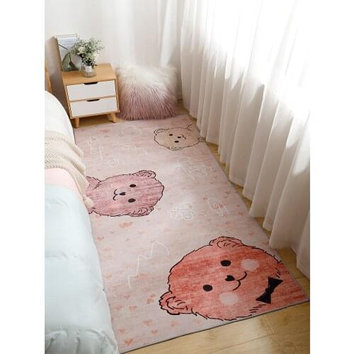 The carpet by the bed in the girls bedroom can sleep and sit in the mat of the childs room home