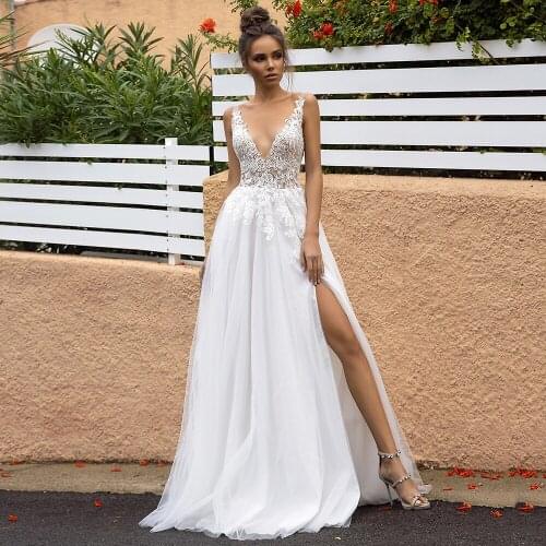 Sexy Deep V-Neck Sleeveless Wedding Dress 2021 Tulle Floor Legnth Sweep Train Corset Lace Backless Bridal Gowns Robe De Mariée