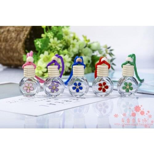 Beatiful 8ml New Car Hanging Glass Perfume Bottle with Alloy Color Daisy Car Essential Oil Bottle 100PCS/LOT