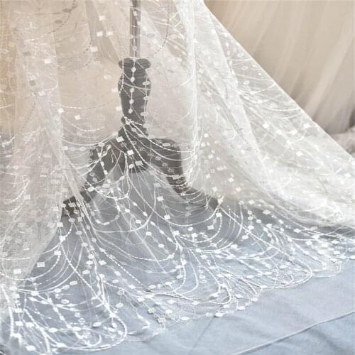 Delicate Ivory African Net Lace Fabric Sequins Latest Waves Fringe French Lace Fabric For Wedding 1yard