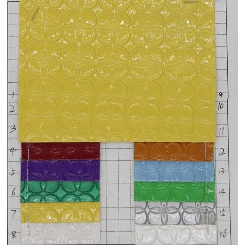 Factory wholesale semi-PU leather special leather bright surface embossed pattern faux leather fabric material