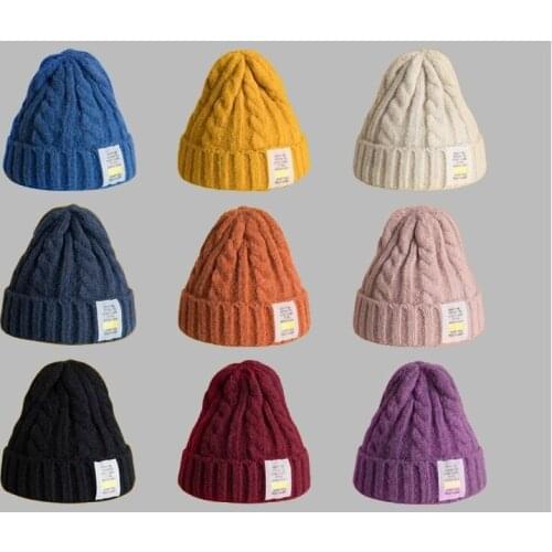 Autumn and winter warm womens cap twist knit hat new curled thick wool soft bone hat off white Beanie cap for men