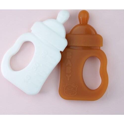 Cartoon Milk Bottle Shape Baby Teether Silicone Chewing Teething Nursing Soother F3ME