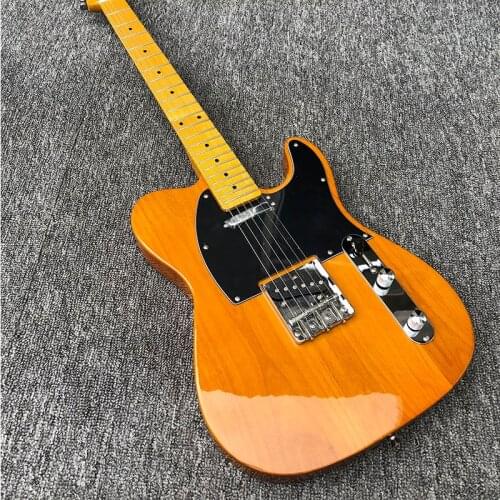 Factory customized 6-string electric guitar, egg-yellow paint, alder body, retro neck, and string on the back