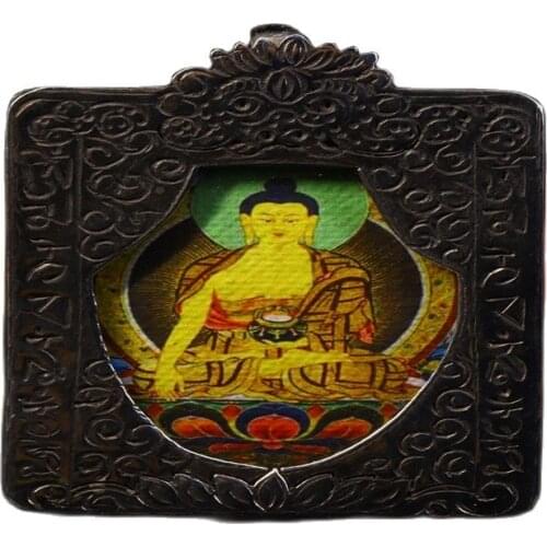 Early collection of Nepalese gilt hand-painted thangka pendants