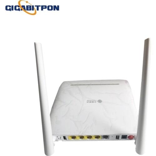 Free shipping F673A V9 ONT4GE+2USB+Tel+2.4G&5G port dual English firmware SIP FTTH fiber optic terminal with power and box
