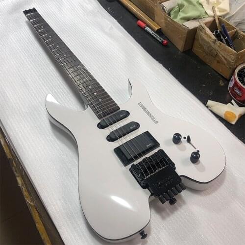 Factory direct portable headless travel electric guitar, black paint, white accessories, free shipping