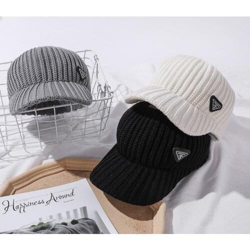 Autumn and Winter New Knitted Hat Ladies Korean Fashion Wild Hair Empty Top Hats Cold and Warm Street Outdoor Sports Wool Cap