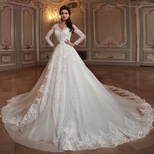 Julia Kui V-Neckline A-Line Wedding Dress With Natural Waistline Bust Buttons Of Cap Sleeve