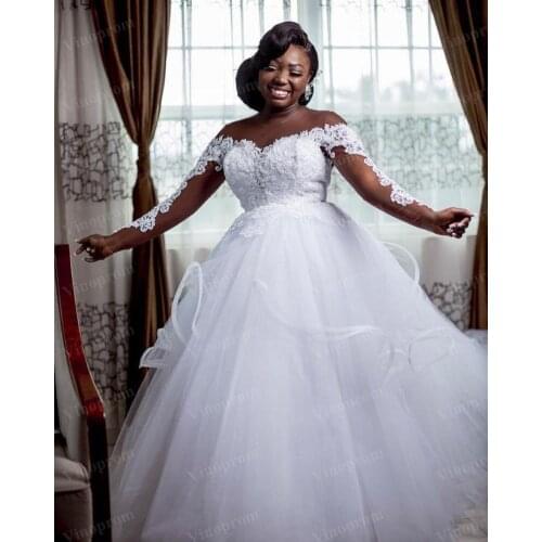 Plus Size Arabic Lace Beaded Cheap Wedding Dresses Sheer Neck Bridal Dresses Long Sleeves Wedding Gowns 2021