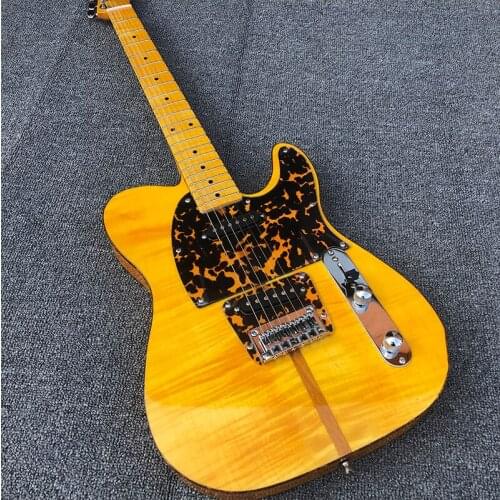 High-quality 6-string electric guitar, front and back tiger maple veneer, peach blossom core sandwich, retro neck, dog head guit
