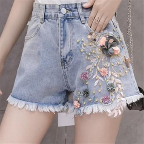 2021 New Best-selling Exquisite Embroidery Denim Shorts with Ripped Raw Edges Womens Fashion Shorts 3D Stereo Womens Clothing