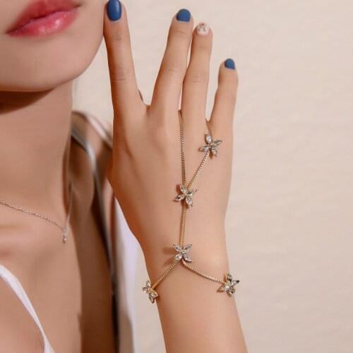 Exquisite studded bracelet female students simple and fresh four-leaf flower finger chain girl heart hand jewelry