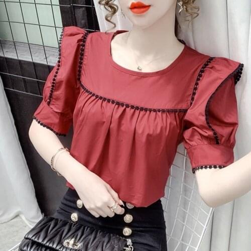 Round neck wooden ear stitching doll shirt women 2021 summer new design sense niche fashion foreign style wild shirt