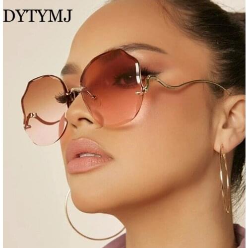 DYTYMJ New Round Rimless Sunglasses Women Oversized Sunglasses for Men Gradient Mirror Shades for Women Retro Gafas De Sol Mujer