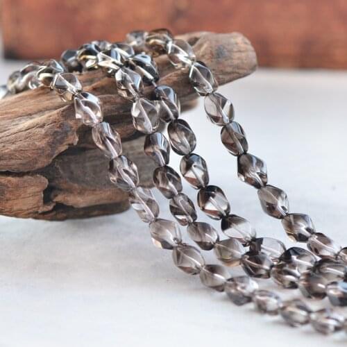 Joanlyn Grade AA Natural Smoky Quartz Twist Beads 7x12mm 15 Inch Strand SQ35