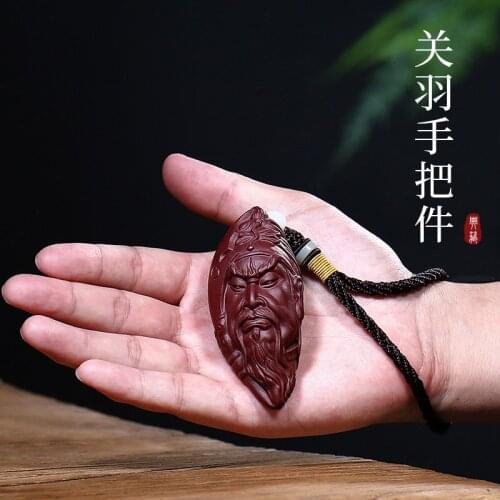 Yixing undressed ore purple sand tea pet dharma manual sculpture tea tea furnishing articles guan yu hand put pieces