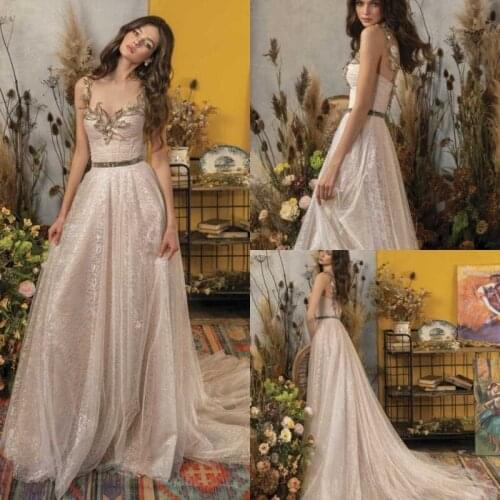 2021 Wedding Dresses Spaghetti Straps Lace Appliques Bridal Gowns Gorgeous Backless Sweep Train A Line Wedding Dress