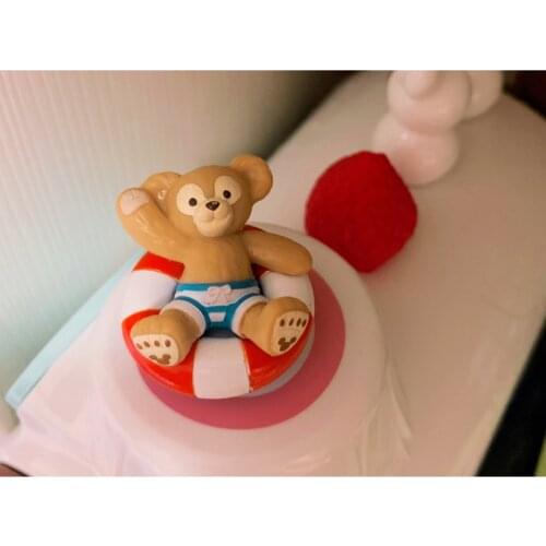 1PCS 5cm High quality Tokyo Disneys final order: dafi series dolls summer dafi swimming circle ornaments collection
