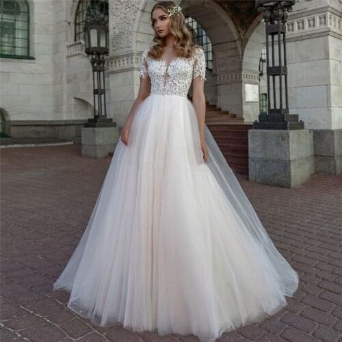 2021 Jewel Neck Tulle Short Sleeves A-Line Wedding Dress Lace Appliques Top Spring Garden Long Robe De Mariee Soft Vestidos