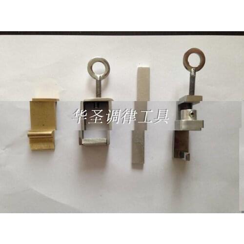 The piano tuning tool The keys White adhesion apparatus