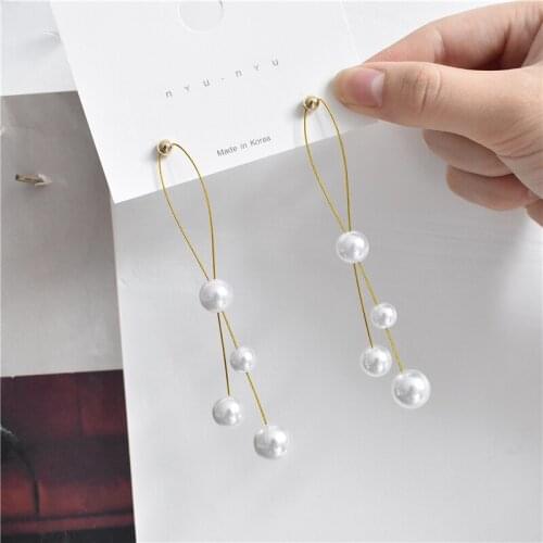 Long temperament pearl double-line tassel earrings female 2020 new atmosphere is thin face earrings earrings