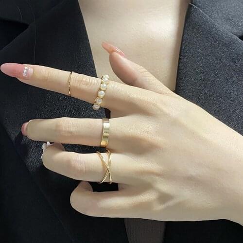 4pcs European and American Fashion Temperament Creative Punk Style Golden Ring Inlaid Pearl Joint Metal Cross Ring Set
