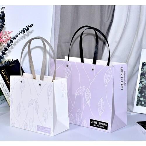 New product simple gift bag spot paper leaf tote bag rivet packaging custom clothing store bags Dragees for Communion details f