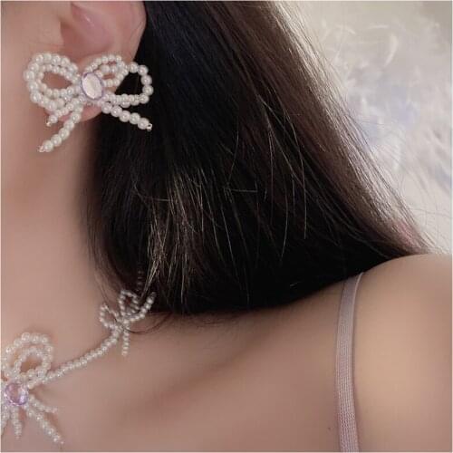 U-Magical Fairy Luxury Beaded Simulation Pearl Dangle Earring for Women Bowknot Hollow Out Rhinestone Earring Jewelry Pendientes