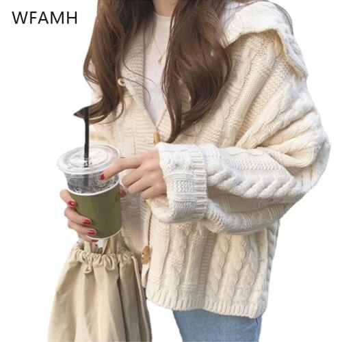 Womens solid color knit sweater 2021 winter new Korean version of loose lapel all-match horn button long-sleeved jacket