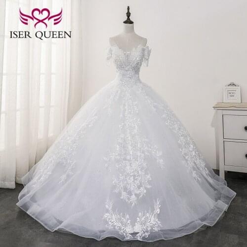 Pretty Embroidery on net Luxury Wedding Dress 2021 New Crystal Beaded Tassel Sleeves Ball Gown Dubai Quality Bride Dress WX0174