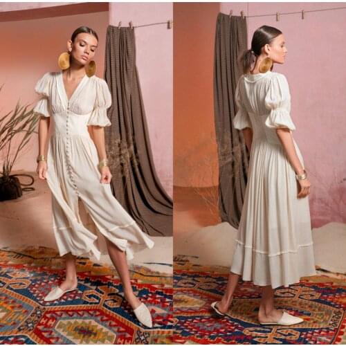 2021 Bohemain A Line Wedding Dresses Jewel Neck Lace Appliqued Long Sleeve Bridal Dress Tea Length Tulle Wedding Dress