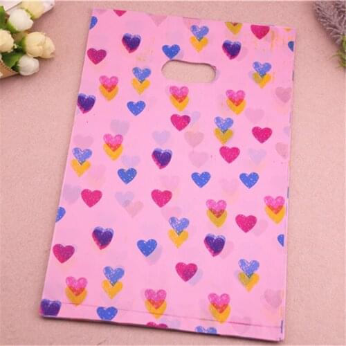 New Design Wholesale 100pcs/lot 20*30cm Pink Lovely Plastic Gift Packaging Bags With Sweet Heart Wedding Sweets Bag