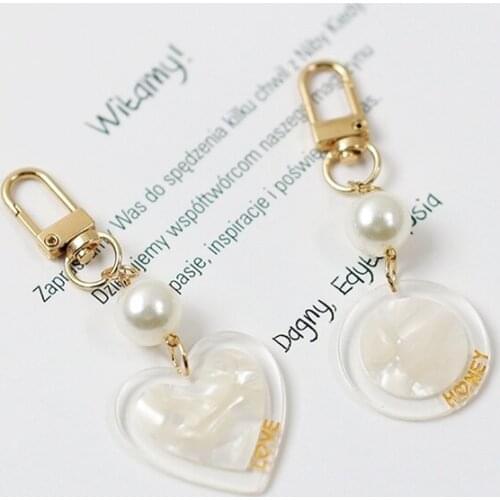 High Quality Shell Texture Pearl Metal Keychain Airpods Small Fresh Protective Cover Pendant Accessory Bag Hanging Car Buckle