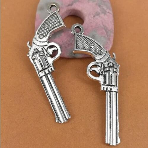 4PCS tibetan silver color crafted 2sided gun design charms H0401