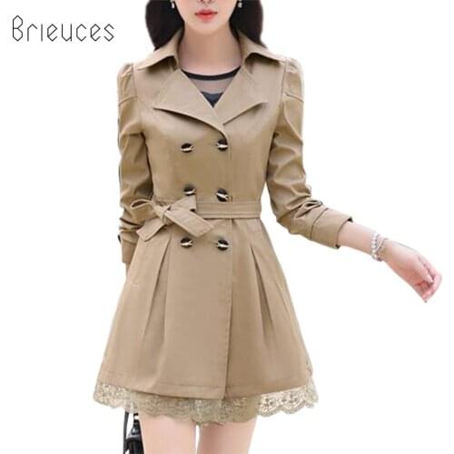 The new high - quality thin section of the long - sleeved windbreaker jacket women color code in the long paragraph coat jacket