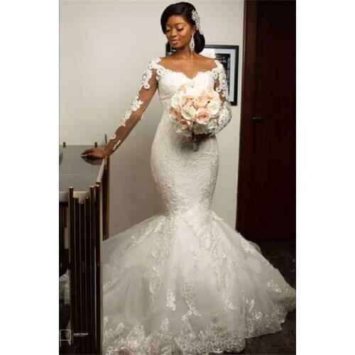Latest African Mermaid Wedding Dresses Elegant IIIsion Long Sleeves Lace Appliques Bridal Gowns Vestido de noiva